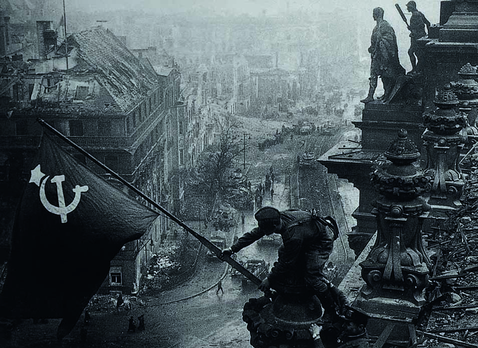 Red Stars over Russia Yevgeny-Khaldei-Soviet-soldiers-raising-the-red-flag-over-the-Reichstag-May-1945-Red-Stars-over-Russia
